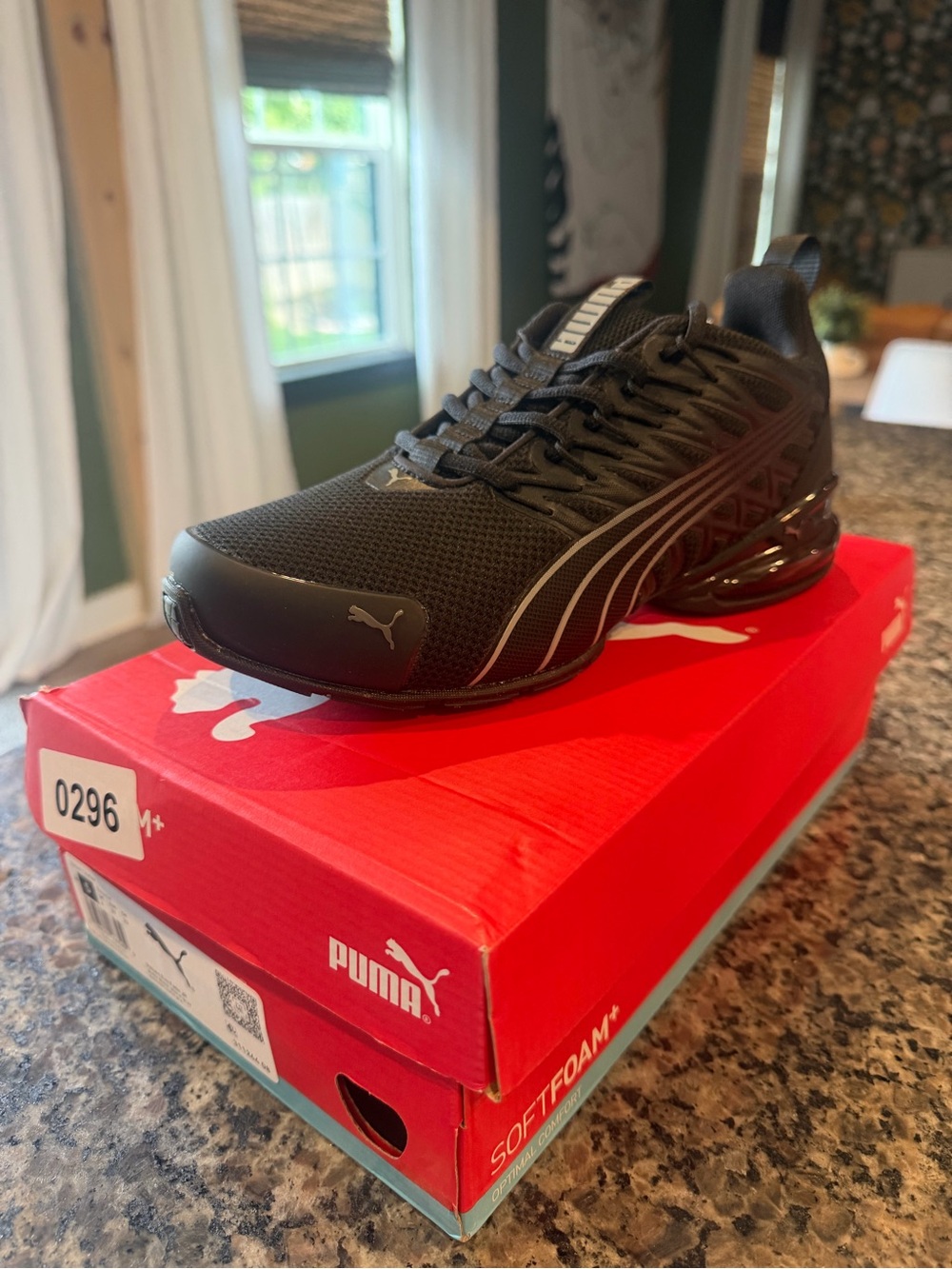 Puma Kids Black Sneaker with Silver Stripe Accents
